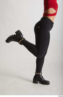  Zuzu Sweet  1 black boots black trousers casual dressed flexing leg side view 0010.jpg